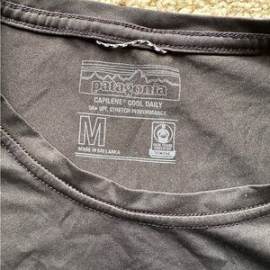 Black and grey Patagonia athletic shirt